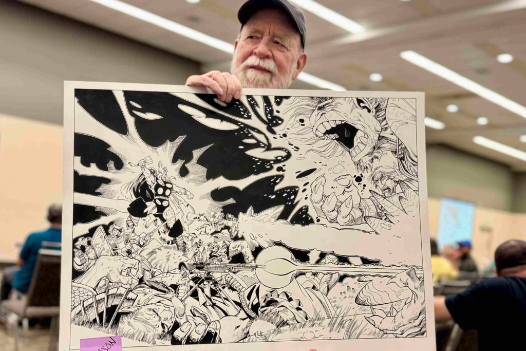 Walter Simonson with original Thor art for the Hero initiative auction, Baltimore Comic-Con, September 26, 2026. Photo by Greg Goldstein.